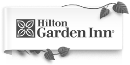 A black and white photo of the hilton garden inn logo.